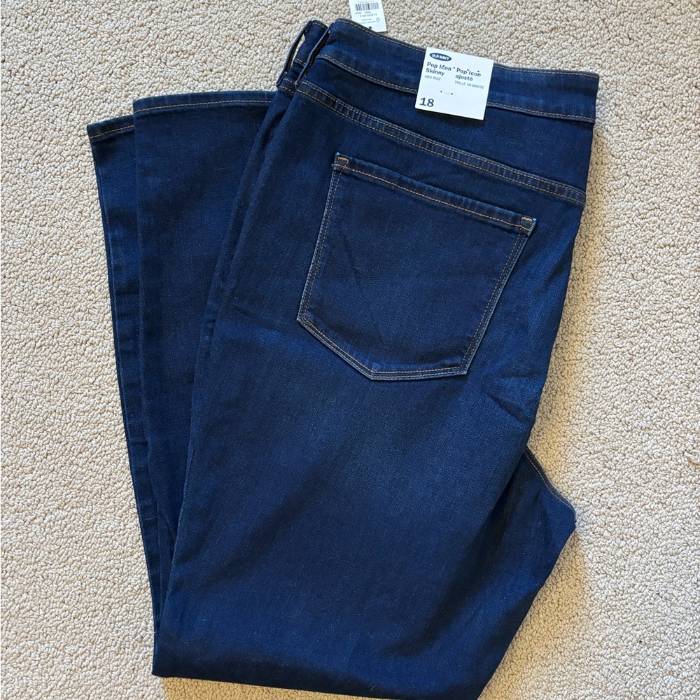 New with tags Pop Icon Skinny mid rise jeans. Dark wash. Size 18